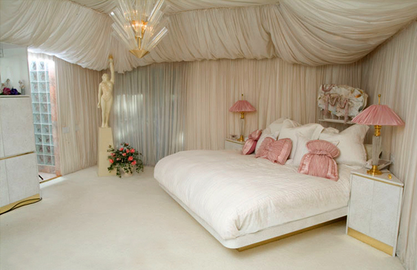 A room that is storybook, yet soft and inviting. We converted the color of the furniture to beautiful cherry burl veneer and installed axminster floral carpeting.