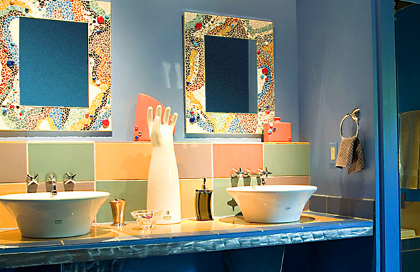 Funky Powder room. The client had the crazy mosaic mirrors and the goal was to match up the rest of the room. You be the judge.
